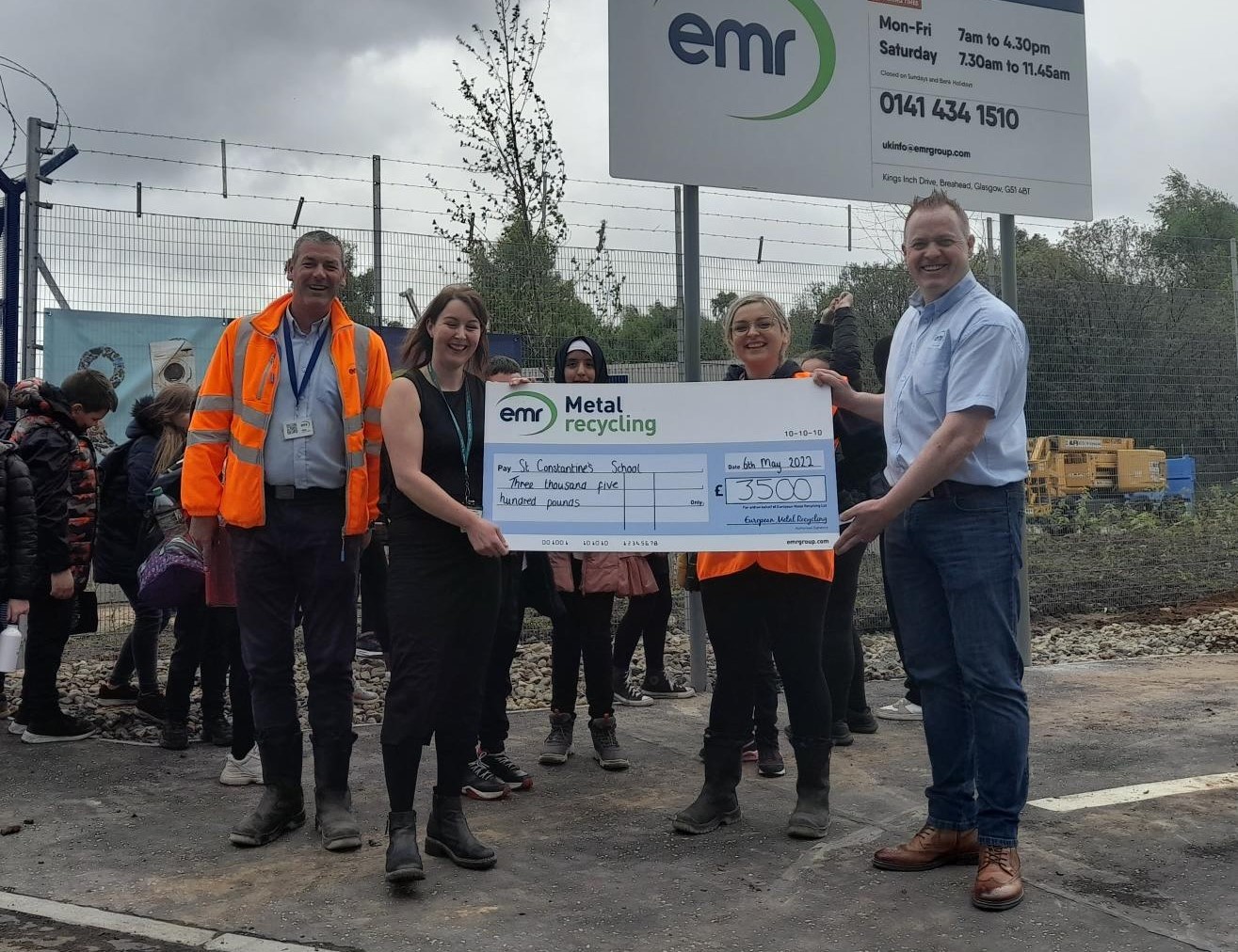 The team at EMR Glasgow award donation to St Constantine's Primary School
