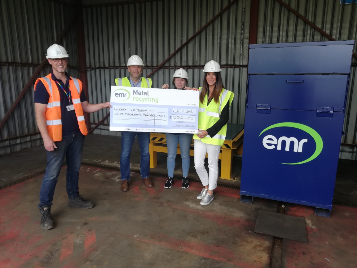 Christopher Saville, Operations Manager at EMR Rochester, awards donation to The Young Lives Foundation