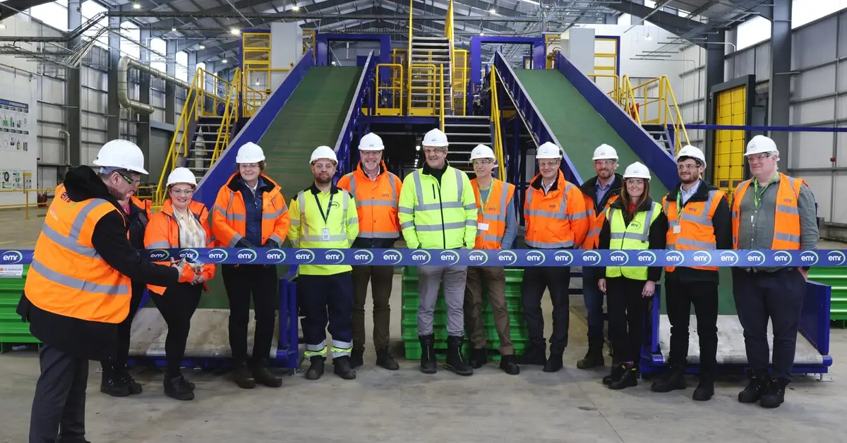 Chris Preston cutting the ribbon