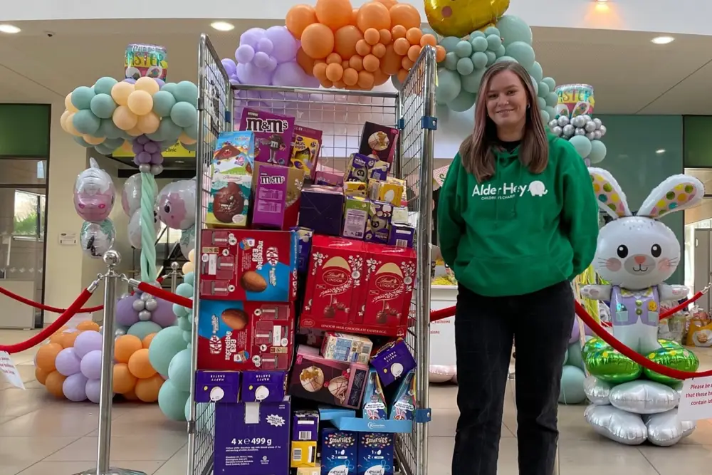 Person receiving easter egg donation at Alder Hey