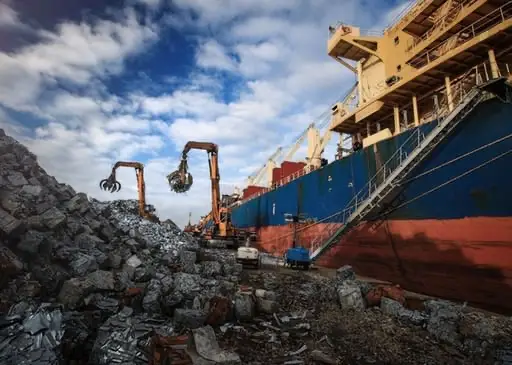 Ship being loaded with recycling materials