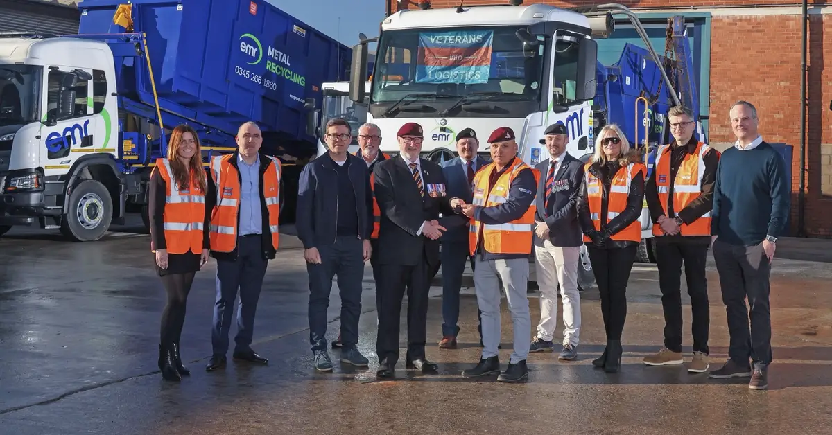 Standing left to right: (left to right) Janna Caley, Global Marketing Director at EMR, Barry Flannagan, Head of Social Responsibility at EMR, Andy Burnham, Mayor of Manchester, John Harker OBE General Manager, Veterans into Logistics ,  Paul Boulds, Central Transport Operations Manager at EMR , Mark Harrison, North West Transport Manager at EMR,  Darren Wright, Founder of Veterans into Logistics and former Royal Artillery Airborne Gunner, Tom Russell, Head of People Capability at EMR, Heidi Chapman, Veterans into Logistics Trustee, Former Amazonian and Army Captain Ed Hattersley, and Ian Sheppard, Managing Director of EMR